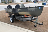 Combo of canoe plus motor plus trailer - [click here to zoom]